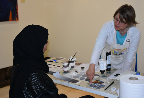 AlisonExaminesArtwork_WEB